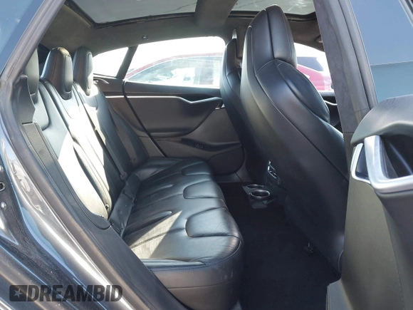 2017 Tesla Model S 100D z VIN 5YJSA1E20HF189557, wystawiony jako IAAI lot #41546084 z przebiegiem 253 218 mil mil oraz . Historia ofert i sprzedaży dostępna na DreamBid. Obrazek 8.