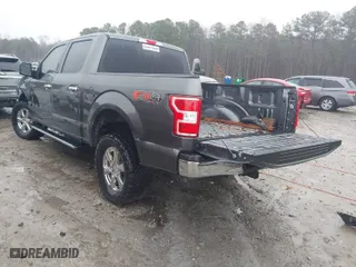 2018 Ford F-150 XL with VIN 1FTEW1E53JFC38812, listed as a IAAI auction lot 41514489 with 112,851 mi miles. Bid and sale history available at carsss.com. Image 3.