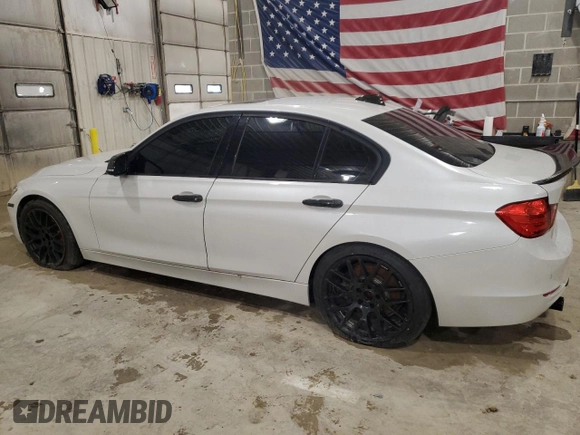 2013 BMW 3 Series 335i with VIN WBA3A9G51DNP36712, listed as a Copart auction lot 52407465 with 117,972 mi miles and Salvage title. Bid and sale history available at DreamBid. Image 2.