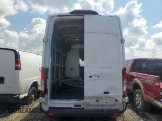 2023 Ford Transit Cargo with VIN 1FTBR1X87PKB07660, listed as a Copart auction lot 63852975 with 37,357 mi miles and Salvage title. Bid and sale history available at DreamBid. Image 6.