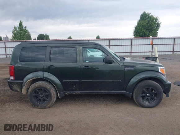 2010 Dodge Nitro SE z VIN 1D4PU2GK4AW125087, wystawiony jako IAAI lot #42554853 z przebiegiem 82 282 mil mil oraz . Historia ofert i sprzedaży dostępna na DreamBid. Obrazek 14.