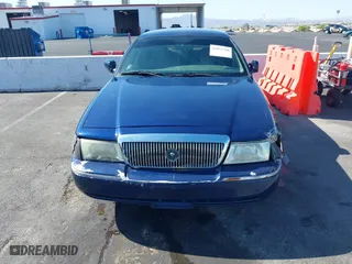 2004 Mercury Grand Marquis GS with VIN 2MEFM74W94X632233, listed as a IAAI auction lot 42051360 with 167,654 mi miles. Bid and sale history available at carsss.com. Image 6.