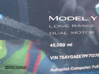2023 Tesla Model Y Long Range with VIN 7SAYGAEE7PF713761, listed as a IAAI auction lot 41638067 with 46,089 mi miles and . Bid and sale history available at DreamBid. Image 7.