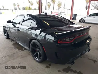 2019 Dodge Charger SRT Hellcat with VIN 2C3CDXL97KH552439, listed as a IAAI auction lot 41813879 with 58,921 mi miles and . Bid and sale history available at DreamBid. Image 3.