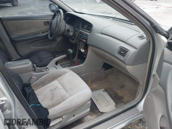 1999 Nissan Altima XE with VIN 1N4DL01D5XC180276, listed as a IAAI auction lot 41584645 with 248,376 mi miles. Bid and sale history available at carsss.com. Image 5.