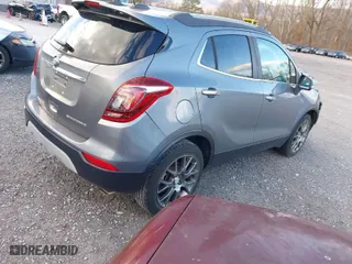 2019 Buick Encore Sport Touring with VIN KL4CJ1SB3KB962065, listed as a IAAI auction lot 41206207 with 59,618 mi miles. Bid and sale history available at carsss.com. Image 4.