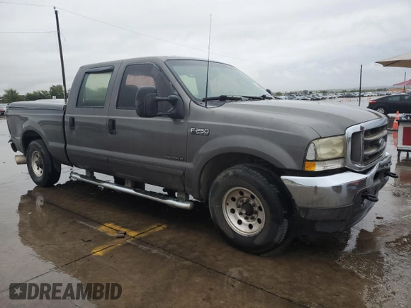 2003 Ford Super Duty F-250 XL with VIN 1FTNW20F53EA25424, listed as a Copart auction lot 72467814 with 405,305 mi miles and Salvage Title. Bid and sale history available at carsss.com. Image 4.