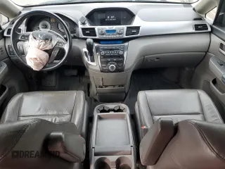 2012 Honda Odyssey Touring with VIN 5FNRL5H94CB109257, listed as a Copart auction lot 59636075 with 107,543 mi miles and Salvage title. Bid and sale history available at DreamBid. Image 8.