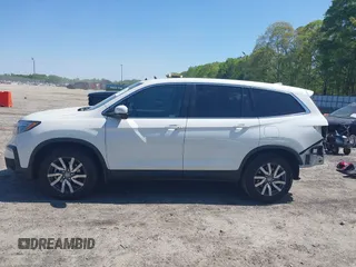 2019 Honda Pilot EX-L with VIN 5FNYF5H57KB038019, listed as a IAAI auction lot 41994410 with 126,738 mi miles and . Bid and sale history available at carsss.com. Image 15.