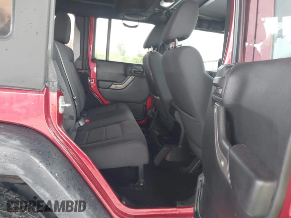 2012 Jeep Wrangler Unlimited Sport z VIN 1C4BJWDG3CL207291, wystawiony jako IAAI lot #42211454 z przebiegiem 110 864 mil mil oraz . Historia ofert i sprzedaży dostępna na DreamBid. Obrazek 8.