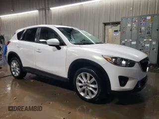 2014 Mazda CX-5 Grand Touring with VIN JM3KE4DY7E0417308, listed as a Copart auction lot 88161195 with 107,493 mi miles and Salvage Title. Bid and sale history available at carsss.com. Image 4.