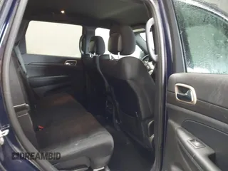 2016 Jeep Grand Cherokee Laredo with VIN 1C4RJFAG5GC434359, listed as a IAAI auction lot 42555310 with 128,350 mi miles and . Bid and sale history available at DreamBid. Image 8.