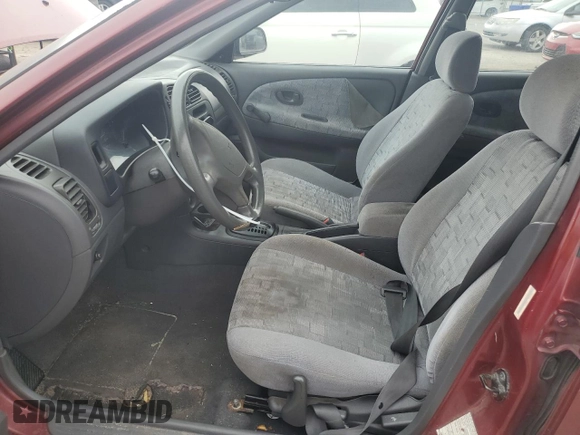 1997 Mitsubishi Mirage DE z VIN JA3AY26AXVU007285, wystawiony jako Copart lot #71958454 z przebiegiem 156 415 mil mil oraz Szkoda całkowita • Salvage title. Historia ofert i sprzedaży dostępna na DreamBid. Obrazek 7.