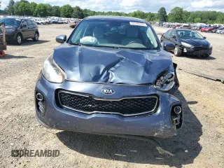 2017 Kia Sportage LX z VIN KNDPMCAC9H7195919, wystawiony jako Copart lot #55166435 z przebiegiem 116 678 mil mil oraz Czysty tytuł • Clean title. Historia ofert i sprzedaży dostępna na DreamBid. Obrazek 5.