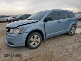 2013 Dodge Journey American Value with VIN 3C4PDCAB6DT556889, listed as a Copart auction lot 60369305 with 117,085 mi miles and Salvage title. Bid and sale history available at DreamBid. Image 1.