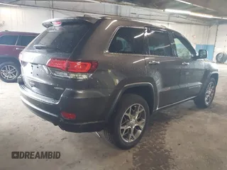 2021 Jeep Grand Cherokee 80th Anniversary z VIN 1C4RJFBG1MC831772, wystawiony jako IAAI lot #42227486 z przebiegiem 50 082 mil mil oraz . Historia ofert i sprzedaży dostępna na DreamBid. Obrazek 4.