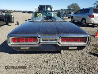 1965 Ford Thunderbird with VIN 5Y85Z115781, listed as a Copart auction lot 82289124 with 75,677 mi miles and Salvage Title. Bid and sale history available at DreamBid. Image 6.