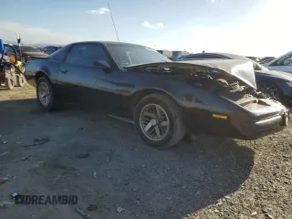 1989 Pontiac Firebird z VIN 1G2FS2186KL212458, wystawiony jako Copart lot #56995025 z przebiegiem 89 851 mil mil oraz Szkoda całkowita • Salvage title. Historia ofert i sprzedaży dostępna na DreamBid. Obrazek 4.