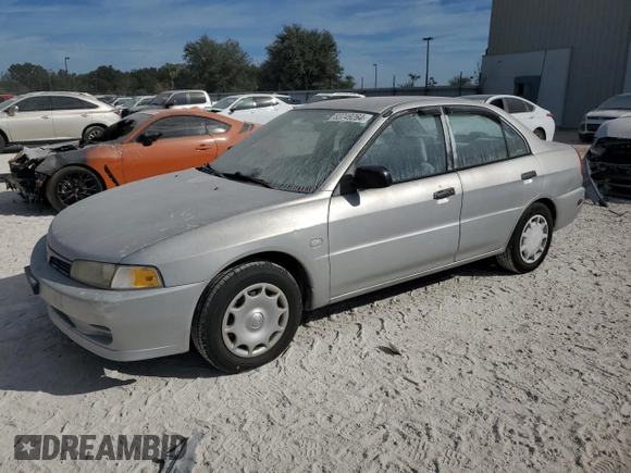 2001 Mitsubishi Mirage ES z VIN JA3AY26CX1U030593, wystawiony jako Copart lot #83749264 z przebiegiem 107 641 mil mil oraz Szkoda całkowita • Salvage title. Historia ofert i sprzedaży dostępna na DreamBid. Obrazek 1.