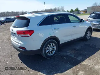 2016 Kia Sorento LX with VIN 5XYPGDA55GG081559, listed as a IAAI auction lot 41965683 with 94,177 mi miles. Bid and sale history available at carsss.com. Image 4.