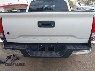 2021 Toyota Tacoma SR with VIN 3TYAX5GN6MT018475, listed as a IAAI auction lot 41966835 with 42,780 mi miles and . Bid and sale history available at DreamBid. Image 16.