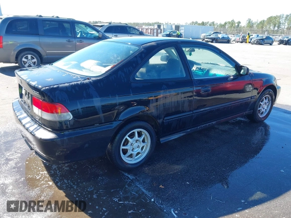 1999 Honda Civic HX with VIN 1HGEJ7123XL068508, listed as a IAAI auction lot 41803733 with 191,412 mi miles. Bid and sale history available at carsss.com. Image 4.