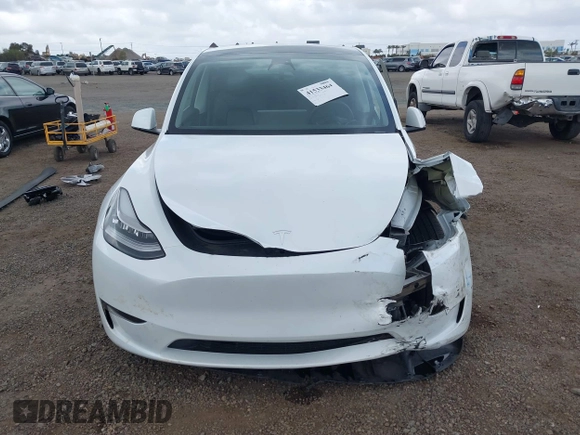 2023 Tesla Model Y Long Range with VIN 7SAYGDEE6PA064162, listed as a IAAI auction lot 41533464 with 24,337 mi miles. Bid and sale history available at carsss.com. Image 13.