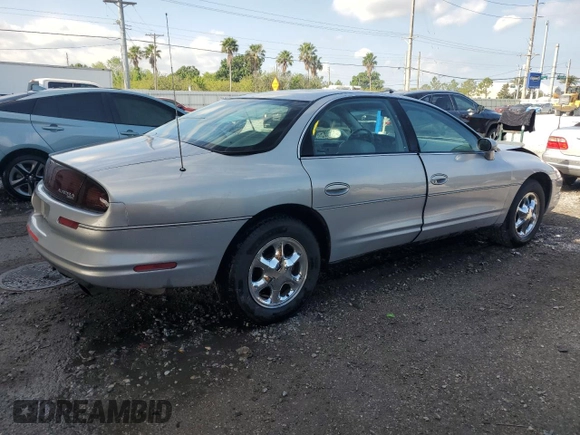 1997 Oldsmobile Aurora with VIN 1G3GR62C0V4102252, listed as a Copart auction lot 53270245 with 123,615 mi miles and Salvage Title. Bid and sale history available at DreamBid. Image 3.
