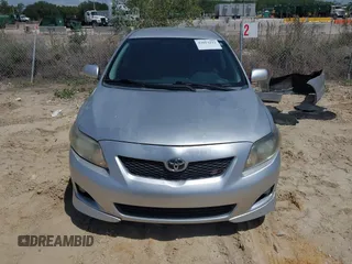 2010 Toyota Corolla with VIN 2T1BU4EE3AC516238, listed as a IAAI auction lot 42013212 with 103,257 mi miles. Bid and sale history available at carsss.com. Image 13.