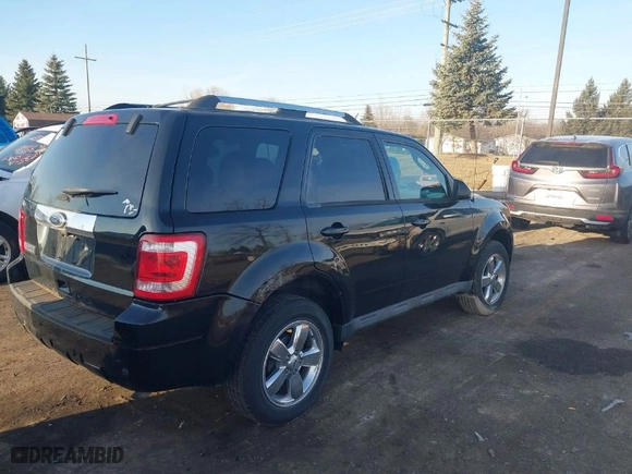 2012 Ford Escape Limited with VIN 1FMCU0E75CKC15868, listed as a IAAI auction lot 41762308 with 101,281 mi miles. Bid and sale history available at carsss.com. Image 4.