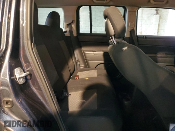 2014 Jeep Patriot Sport with VIN 1C4NJPBB4ED814453, listed as a Copart auction lot 52360025 with 110,848 mi miles and Salvage Title. Bid and sale history available at carsss.com. Image 11.