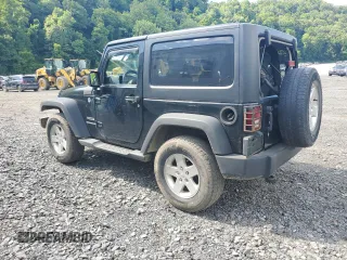 2012 Jeep Wrangler Sport with VIN 1C4AJWAG6CL256792, listed as a Copart auction lot 62634515 with 137,507 mi miles and Salvage title. Bid and sale history available at DreamBid. Image 2.