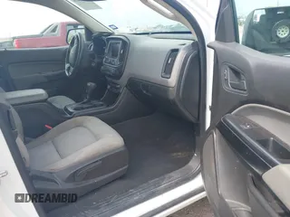 2021 Chevrolet Colorado 2WD Work Truck with VIN 1GCHSBENXM1139792, listed as a IAAI auction lot 42306216 with 78,275 mi miles and . Bid and sale history available at DreamBid. Image 5.