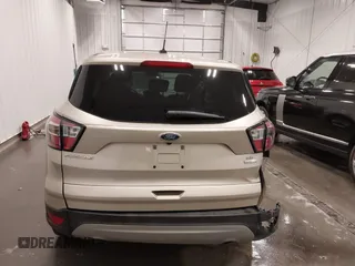 2017 Ford Escape SE z VIN 1FMCU0GD1HUE66952, wystawiony jako IAAI lot #41750959 z przebiegiem 86 442 mil mil oraz . Historia ofert i sprzedaży dostępna na DreamBid. Obrazek 16.