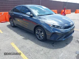 2023 Kia Forte LXS z VIN 3KPF24ADXPE608509, wystawiony jako IAAI lot #42257038 z przebiegiem 19 283 mil mil oraz . Historia ofert i sprzedaży dostępna na DreamBid. Obrazek 1.