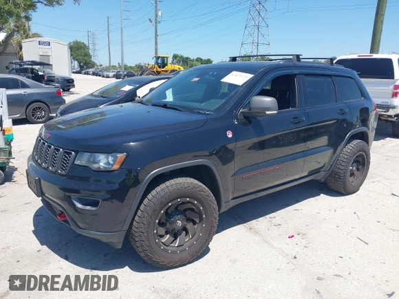 2017 Jeep Grand Cherokee Trailhawk with VIN 1C4RJFLG3HC836072, listed as a IAAI auction lot 42073775 with 139,374 mi miles and . Bid and sale history available at DreamBid. Image 17.