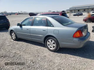 2001 Toyota Avalon XL z VIN 4T1BF28B51U184110, wystawiony jako Copart lot #52398285 z przebiegiem 127 179 mil mil oraz Szkoda całkowita • Salvage title. Historia ofert i sprzedaży dostępna na DreamBid. Obrazek 2.