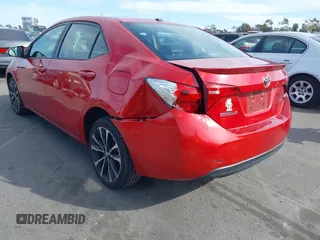 2019 Toyota Corolla L with VIN 2T1BURHE1KC127060, listed as a IAAI auction lot 41761164 with 123,705 mi miles and . Bid and sale history available at DreamBid. Image 3.
