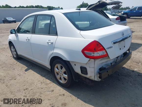 2010 Nissan Versa S with VIN 3N1BC1AP1AL420360, listed as a IAAI auction lot 42404492 with 121,897 mi miles and . Bid and sale history available at DreamBid. Image 3.