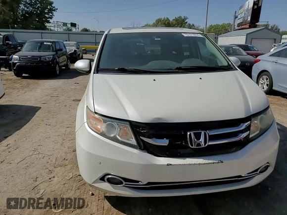 2014 Honda Odyssey Touring z VIN 5FNRL5H92EB059168, wystawiony jako Copart lot #76121914 z przebiegiem 264 715 mil mil oraz Szkoda całkowita • Salvage title. Historia ofert i sprzedaży dostępna na DreamBid. Obrazek 12.