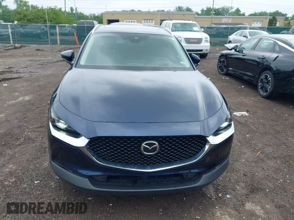 2022 Mazda CX-30 S Premium with VIN 3MVDMBDL0NM413545, listed as a IAAI auction lot 42493594 with 57,013 mi miles and . Bid and sale history available at DreamBid. Image 13.