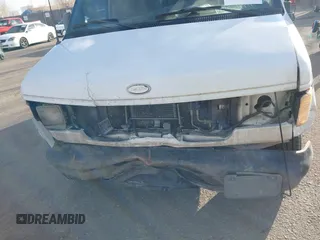 2001 Ford Econoline Cargo Commercial with VIN 1FTNE24L21HA95140, listed as a IAAI auction lot 41490323 with 330,136 mi miles and . Bid and sale history available at carsss.com. Image 6.