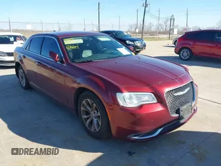 2016 Chrysler 300 Anniversary Edition with VIN 2C3CCAAG3GH212407, listed as a IAAI auction lot 41621006 with 130,821 mi miles and . Bid and sale history available at DreamBid. Image 1.