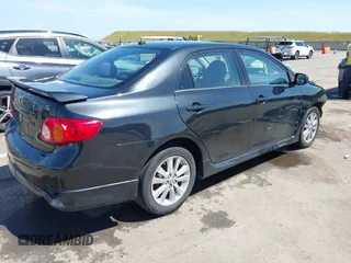 2010 Toyota Corolla with VIN 2T1BU4EE0AC451512, listed as a IAAI auction lot 42099952 with 137,483 mi miles. Bid and sale history available at carsss.com. Image 4.
