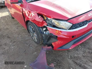 2022 Kia Forte LXS z VIN 3KPF24AD7NE427039, wystawiony jako IAAI lot #41921047 z przebiegiem 46 472 mil mil oraz . Historia ofert i sprzedaży dostępna na DreamBid. Obrazek 6.