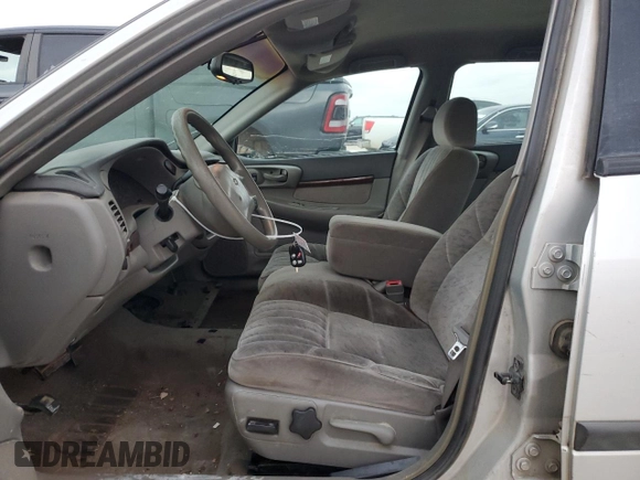 2000 Chevrolet Impala with VIN 2G1WF55E6Y9105243, listed as a Copart auction lot 85991174 with 170,491 mi miles and Salvage title. Bid and sale history available at DreamBid. Image 7.