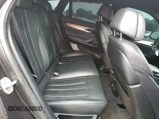 2018 BMW X6 xDrive50i with VIN 5UXKU6C5XJ0W39056, listed as a Copart auction lot 75116634 with 90,043 mi miles and Salvage Title. Bid and sale history available at carsss.com. Image 11.