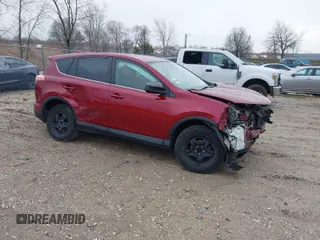 2018 Toyota RAV4 LE with VIN 2T3ZFREV9JW514778, listed as a IAAI auction lot 41202060 with 99,405 mi miles. Bid and sale history available at carsss.com. Image 1.