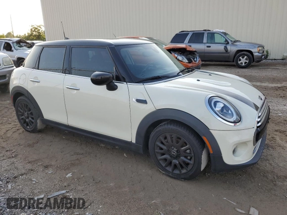 2021 MINI Hardtop 4 Door Oxford Edition with VIN WMWXU7C00M2N76797, listed as a Copart auction lot 56822934 with 44,839 mi miles and Salvage title. Bid and sale history available at DreamBid. Image 4.