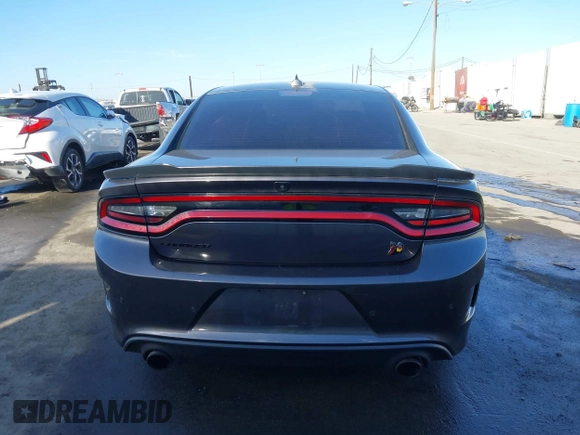2019 Dodge Charger Scat Pack with VIN 2C3CDXGJ7KH588717, listed as a IAAI auction lot 41694673 with Not Provided miles and . Bid and sale history available at DreamBid. Image 15.